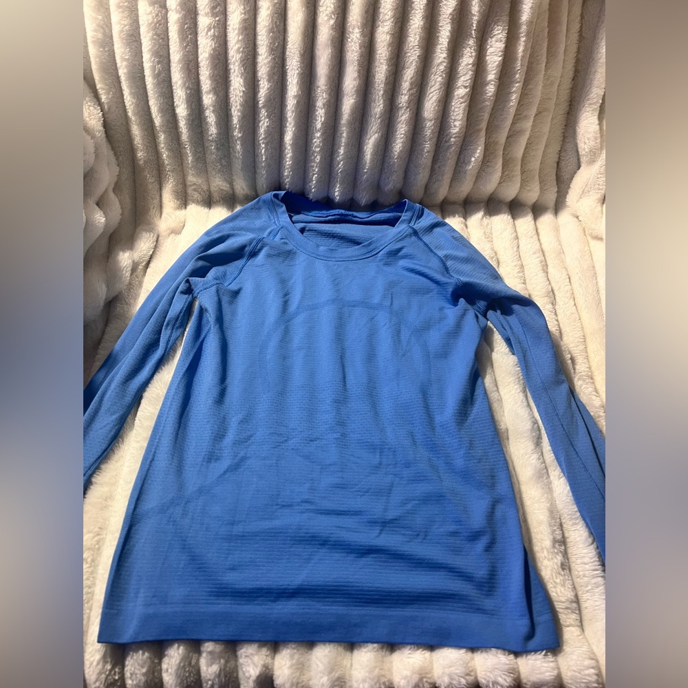 Swiftly Tech Long-Sleeve Shirt 2.0
Waist Length